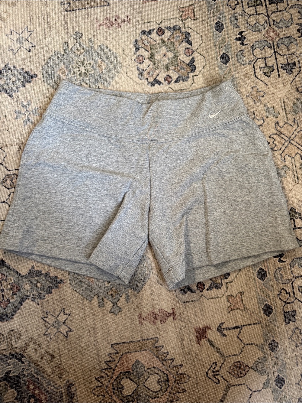 Nike Women's Light Gray Athletic Shorts with Swoosh